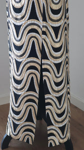Vintage 1960s Brocade metallic dramatic swirl maxi skirt | Modern size Medium